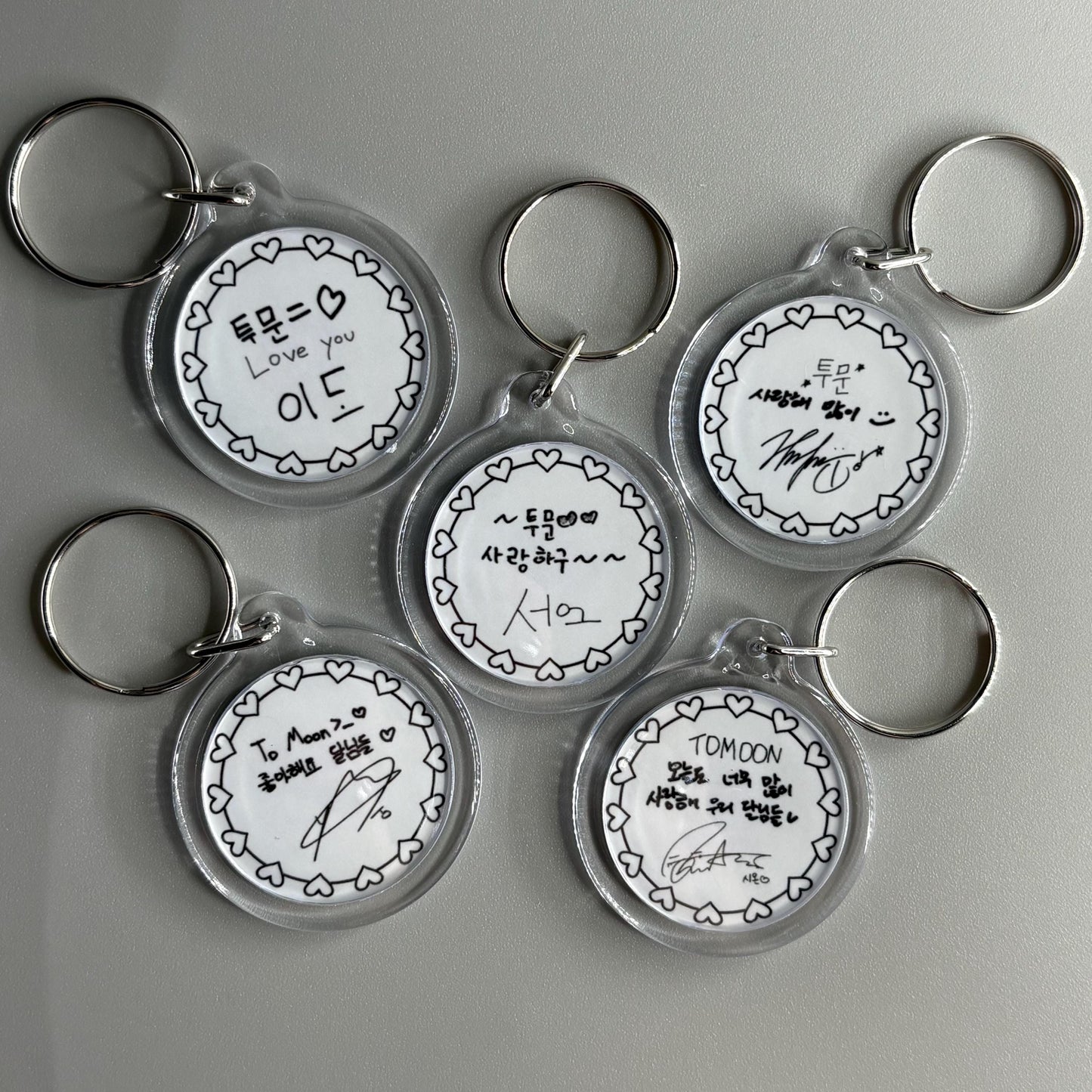 Oneus Double Sided Circle Keychain